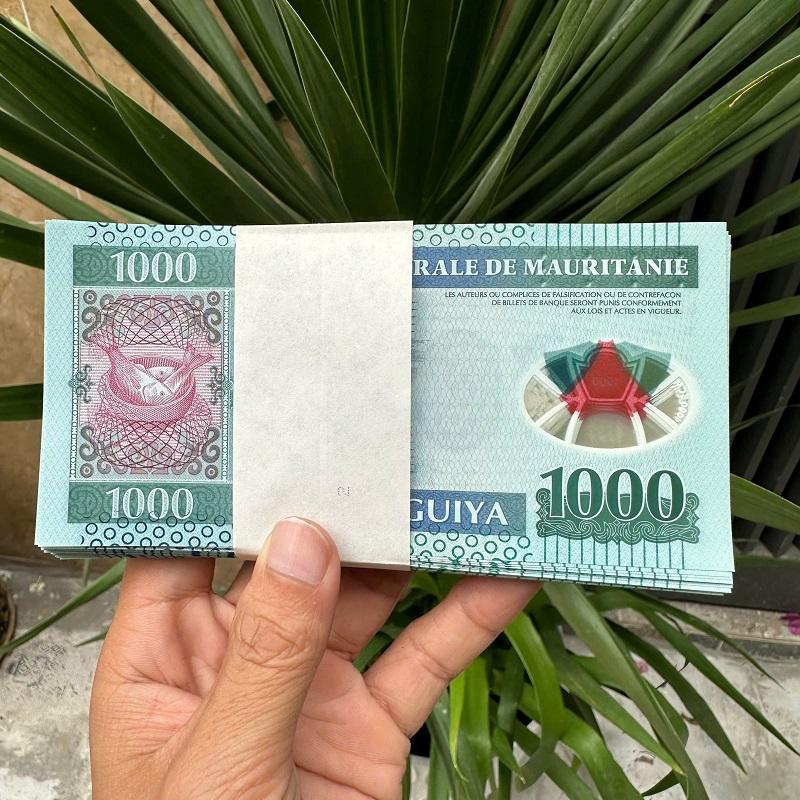 TÉP 100 TỜ TIỀN MAURITANIA 1000 OUGUIYA POLYMER – LÌ XÌ ĐẲNG CẤP & SƯU TẦM